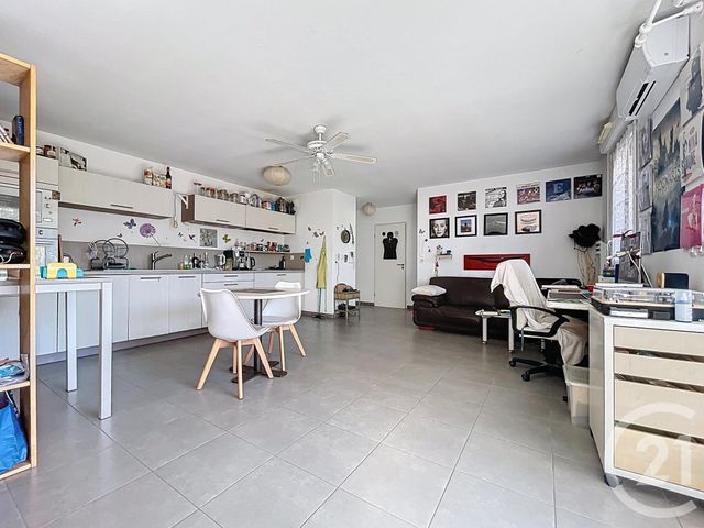 Appartement T2 à vendre - 2 pièces - 52.78 m2 - MAUGUIO CARNON - 34 - LANGUEDOC-ROUSSILLON - Century 21 Agence Soleil