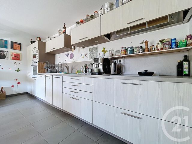 Appartement T2 à vendre - 2 pièces - 52.78 m2 - MAUGUIO CARNON - 34 - LANGUEDOC-ROUSSILLON - Century 21 Agence Soleil