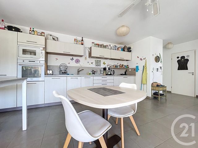 Appartement T2 à vendre - 2 pièces - 52.78 m2 - MAUGUIO CARNON - 34 - LANGUEDOC-ROUSSILLON - Century 21 Agence Soleil