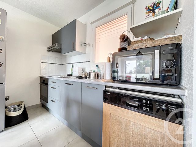 Afficher la photo en grand Appartement T2 à vendre - 2 pièces - 44.46 m2 - MAUGUIO CARNON - 34 - LANGUEDOC-ROUSSILLON - Century 21 Agence Soleil