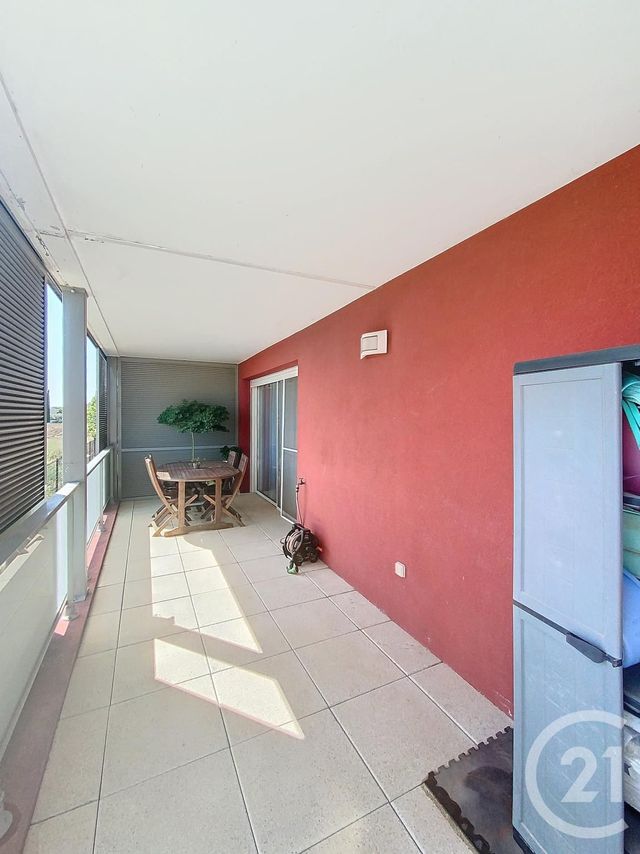 Afficher la photo en grand Appartement F3 à vendre - 3 pièces - 56.6 m2 - MAUGUIO CARNON - 34 - LANGUEDOC-ROUSSILLON - Century 21 Agence Soleil