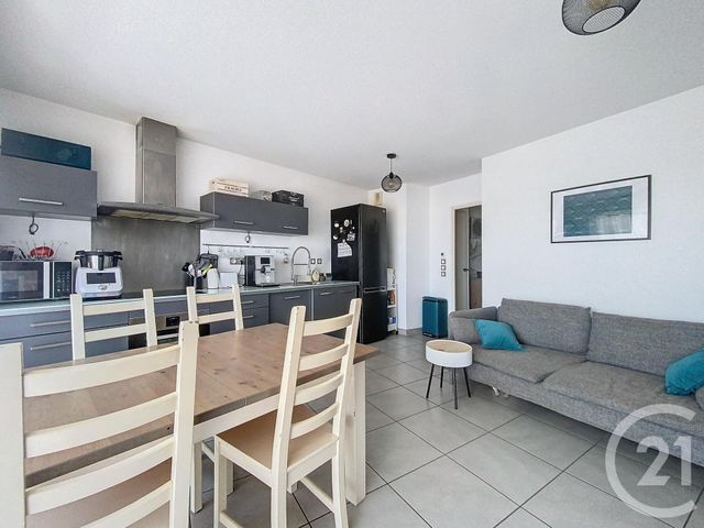 Afficher la photo en grand Appartement F3 à vendre - 3 pièces - 56.6 m2 - MAUGUIO CARNON - 34 - LANGUEDOC-ROUSSILLON - Century 21 Agence Soleil