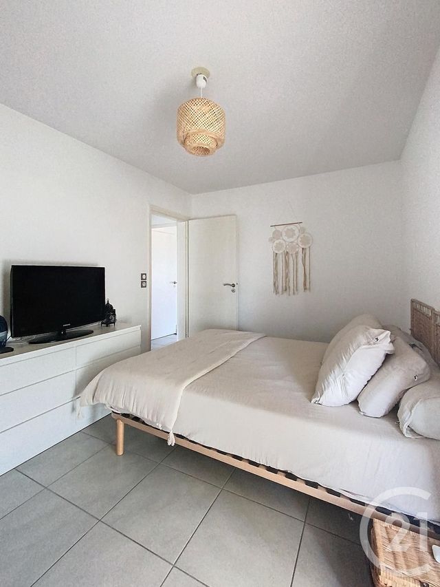 Afficher la photo en grand Appartement F3 à vendre - 3 pièces - 56.6 m2 - MAUGUIO CARNON - 34 - LANGUEDOC-ROUSSILLON - Century 21 Agence Soleil