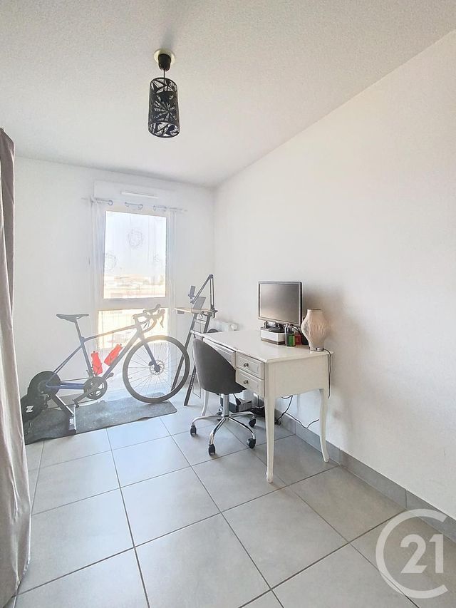 Afficher la photo en grand Appartement F3 à vendre - 3 pièces - 56.6 m2 - MAUGUIO CARNON - 34 - LANGUEDOC-ROUSSILLON - Century 21 Agence Soleil