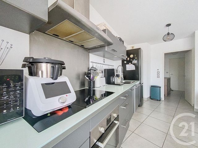 Afficher la photo en grand Appartement F3 à vendre - 3 pièces - 56.6 m2 - MAUGUIO CARNON - 34 - LANGUEDOC-ROUSSILLON - Century 21 Agence Soleil