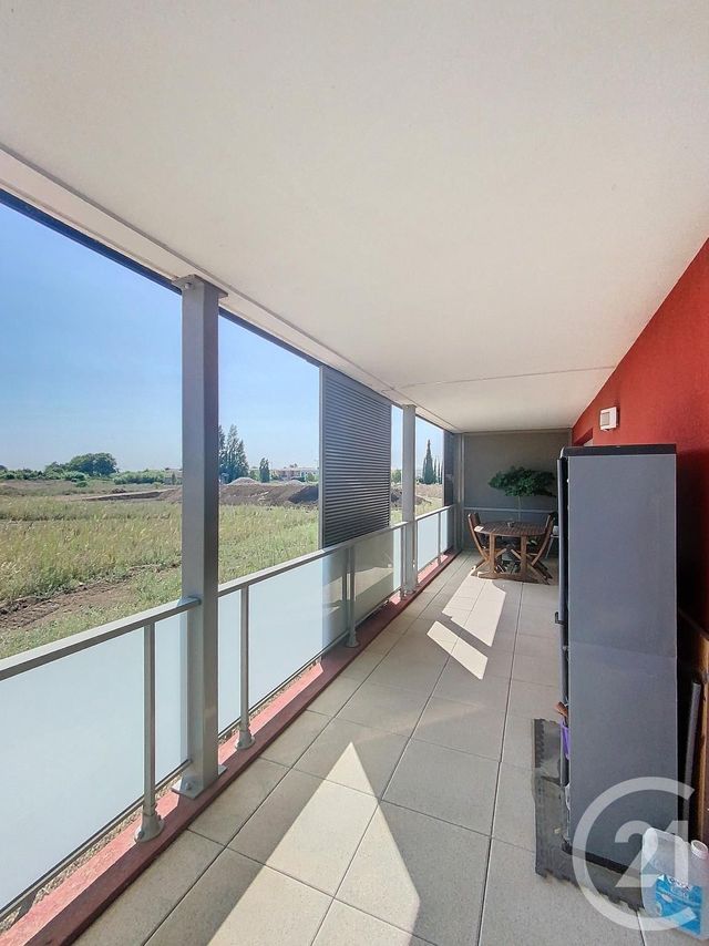 Afficher la photo en grand Appartement F3 à vendre - 3 pièces - 56.6 m2 - MAUGUIO CARNON - 34 - LANGUEDOC-ROUSSILLON - Century 21 Agence Soleil