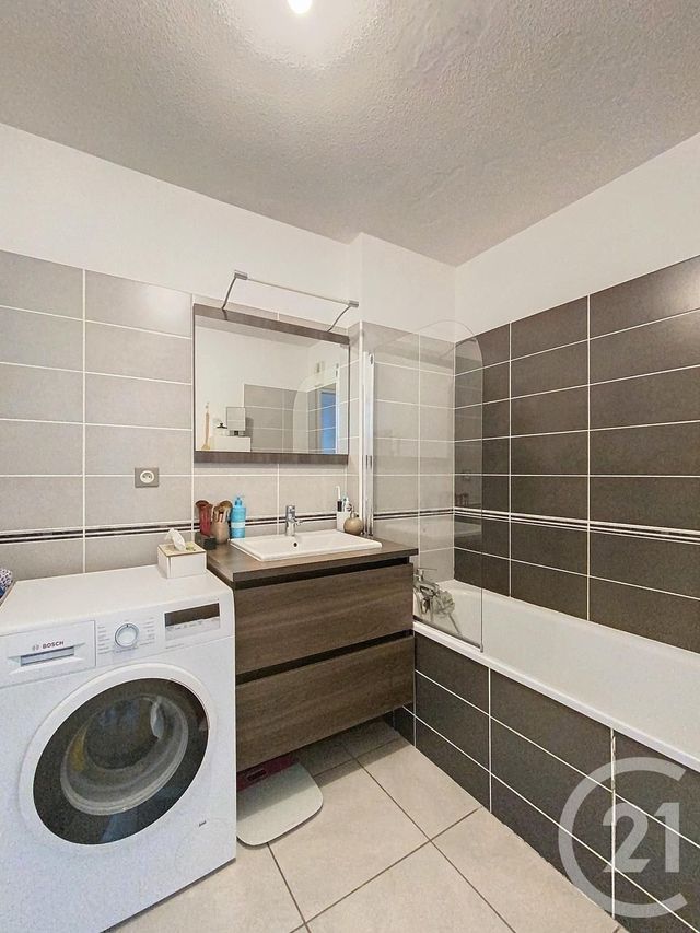 Afficher la photo en grand Appartement F3 à vendre - 3 pièces - 56.6 m2 - MAUGUIO CARNON - 34 - LANGUEDOC-ROUSSILLON - Century 21 Agence Soleil