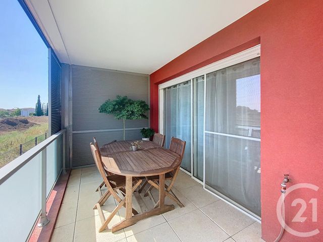 Afficher la photo en grand Appartement F3 à vendre - 3 pièces - 56.6 m2 - MAUGUIO CARNON - 34 - LANGUEDOC-ROUSSILLON - Century 21 Agence Soleil
