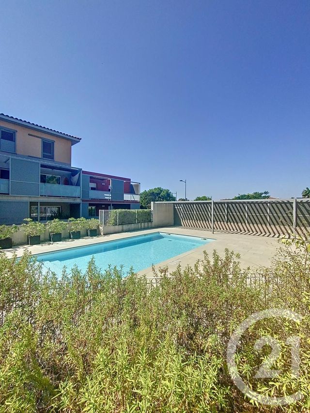 Afficher la photo en grand Appartement F3 à vendre - 3 pièces - 56.6 m2 - MAUGUIO CARNON - 34 - LANGUEDOC-ROUSSILLON - Century 21 Agence Soleil