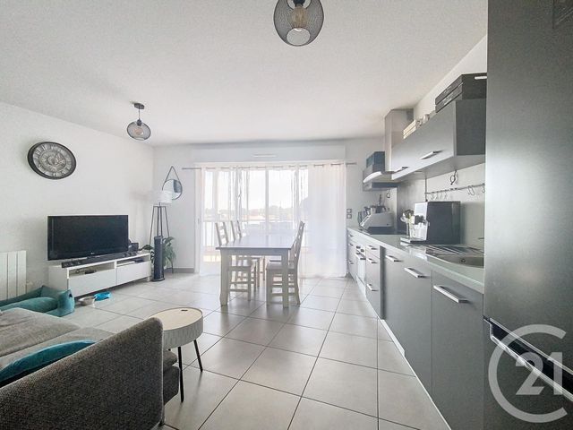 Afficher la photo en grand Appartement F3 à vendre - 3 pièces - 56.6 m2 - MAUGUIO CARNON - 34 - LANGUEDOC-ROUSSILLON - Century 21 Agence Soleil