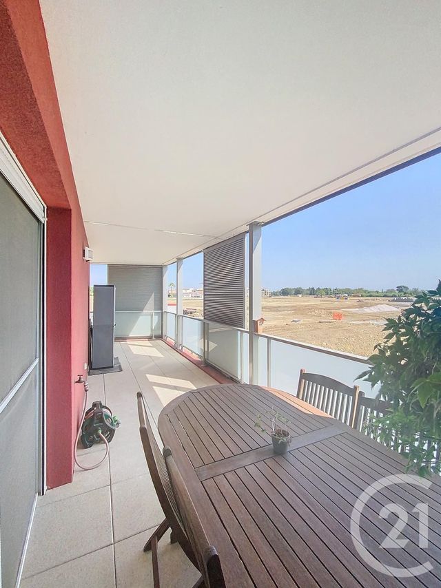 Afficher la photo en grand Appartement F3 à vendre - 3 pièces - 56.6 m2 - MAUGUIO CARNON - 34 - LANGUEDOC-ROUSSILLON - Century 21 Agence Soleil