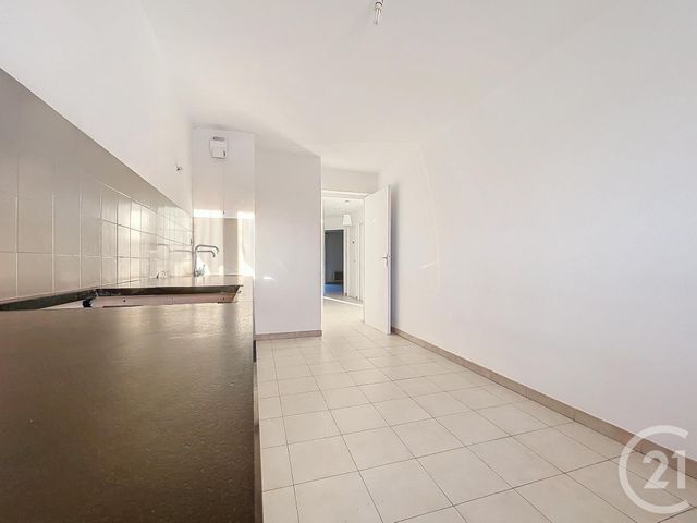 Appartement T3 à vendre - 3 pièces - 74.47 m2 - ST AUNES - 34 - LANGUEDOC-ROUSSILLON - Century 21 Agence Soleil