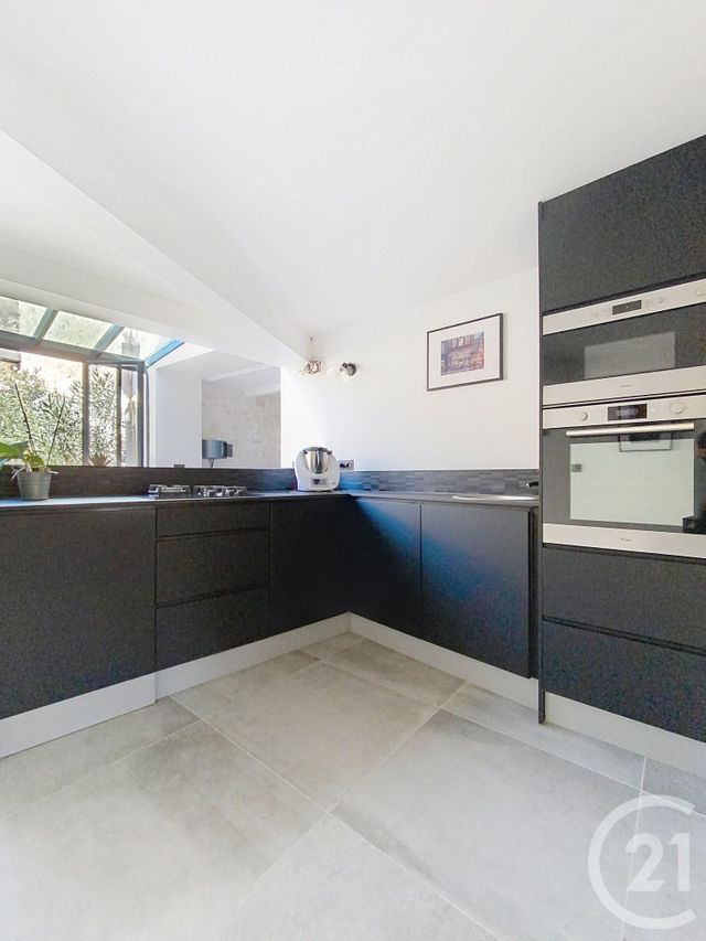 Afficher la photo en grand maison à vendre - 7 pièces - 241.0 m2 - MAUGUIO CARNON - 34 - LANGUEDOC-ROUSSILLON - Century 21 Agence Soleil