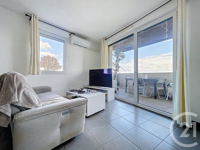 Appartement T2 à vendre - 2 pièces - 48.86 m2 - MAUGUIO CARNON - 34 - LANGUEDOC-ROUSSILLON - Century 21 Agence Soleil