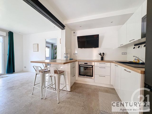 Appartement T2 à louer - 2 pièces - 46.72 m2 - MAUGUIO CARNON - 34 - LANGUEDOC-ROUSSILLON - Century 21 Agence Soleil